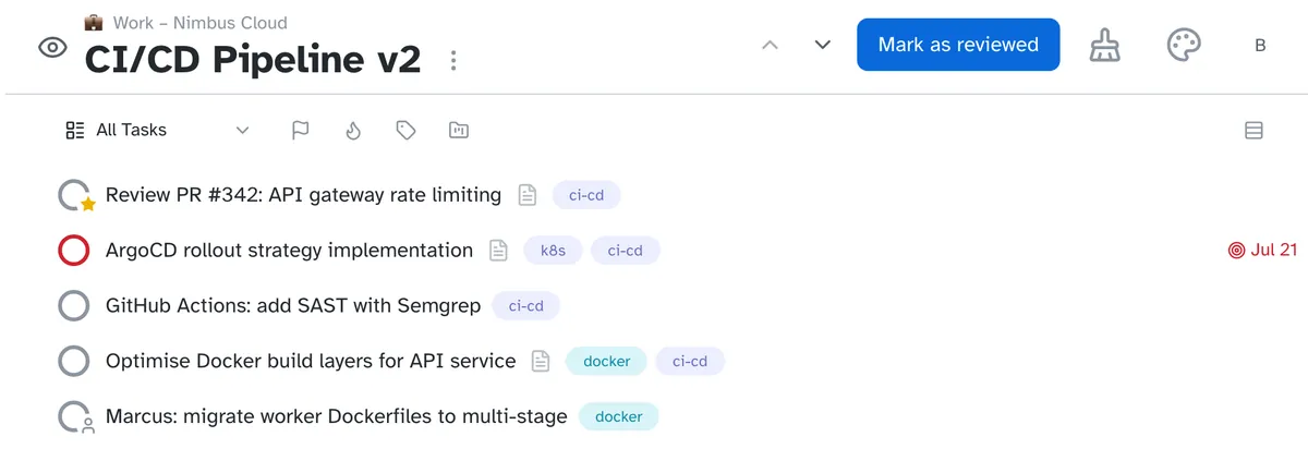 Reviewing a project: its tasks, arrows to step to the next project, and a Mark as reviewed button.
